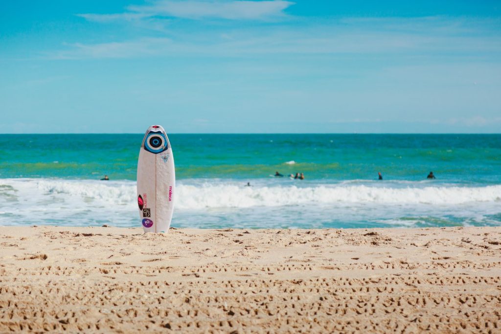 surf board in sand on captiva island